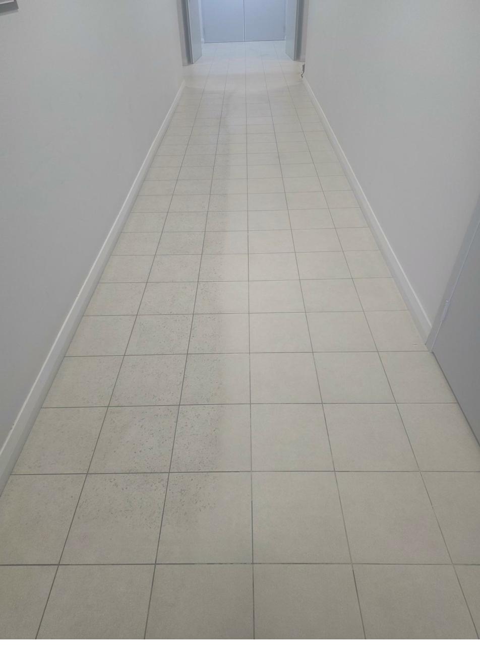 Commercial corridor tile and grout after cleaning